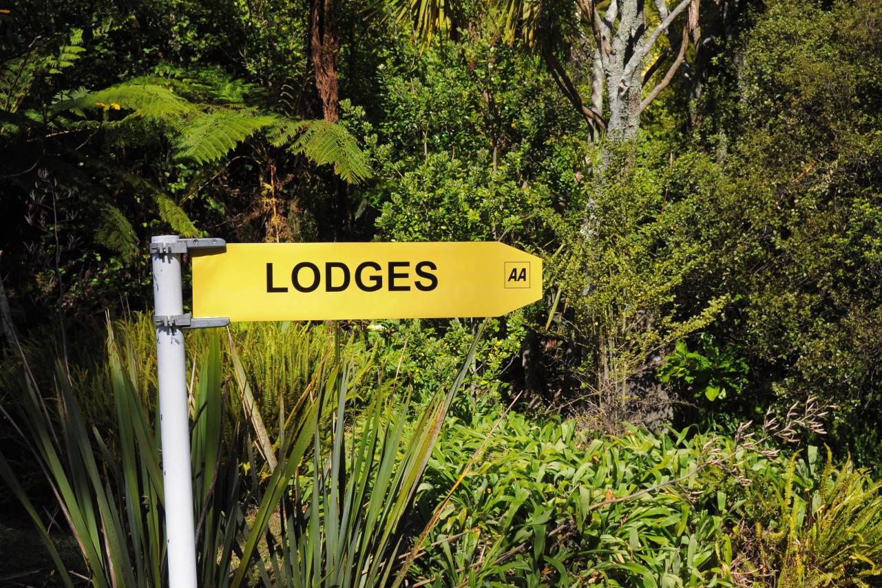 Lodges sign in bush setting