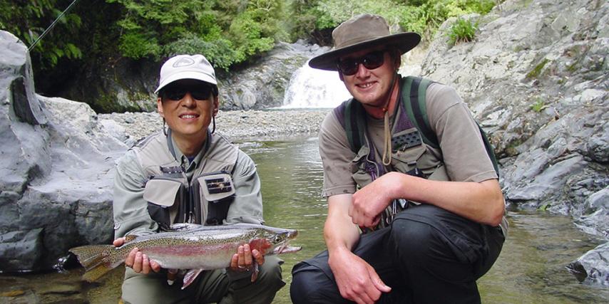 Big Dan and happy customer with trout